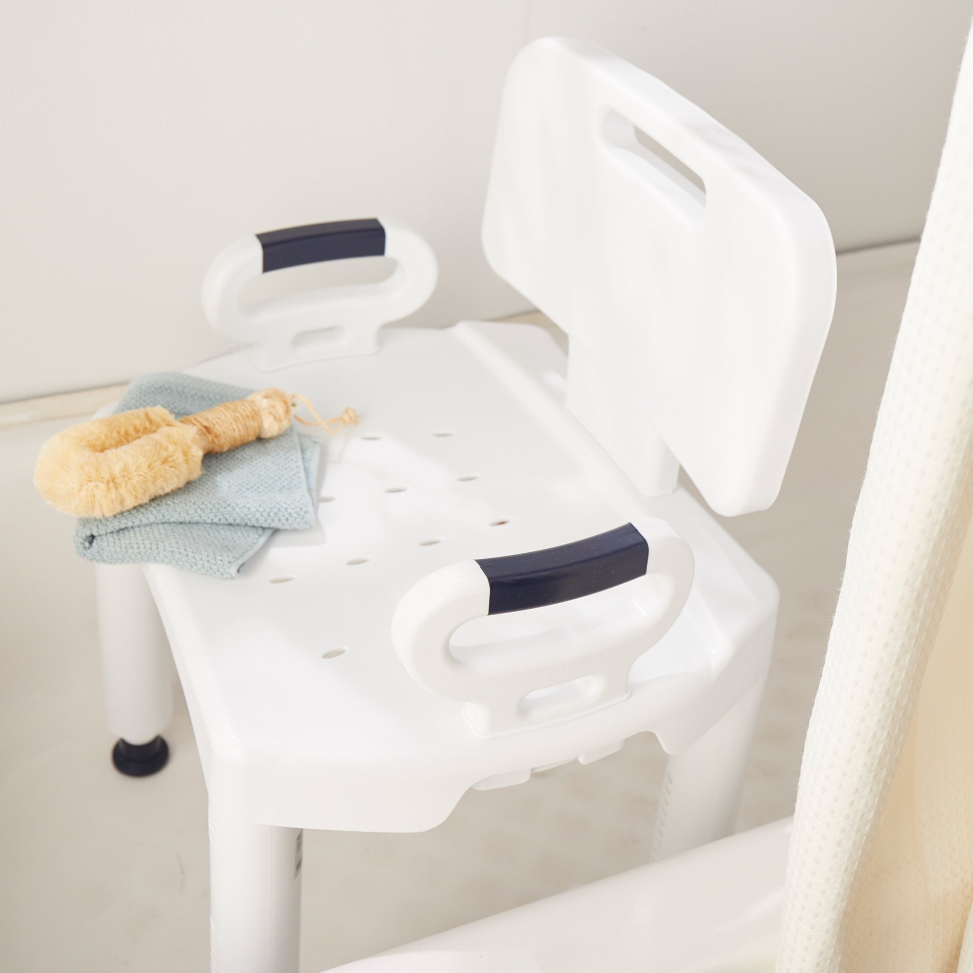 McKesson bath bench with removable arms and back, adjustable plastic shower seat